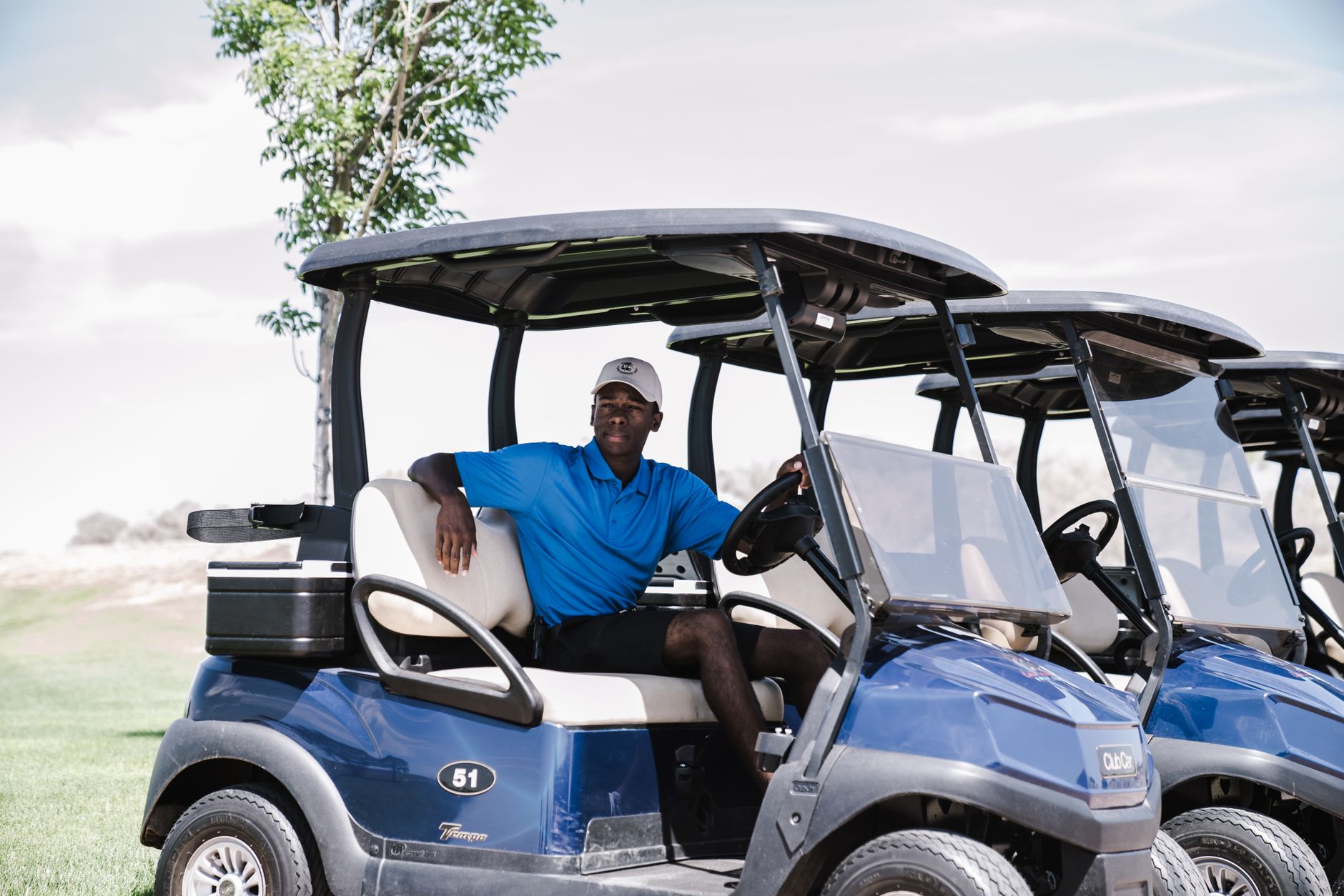 EZGO TXT 6-seat shuttle cart — view 1